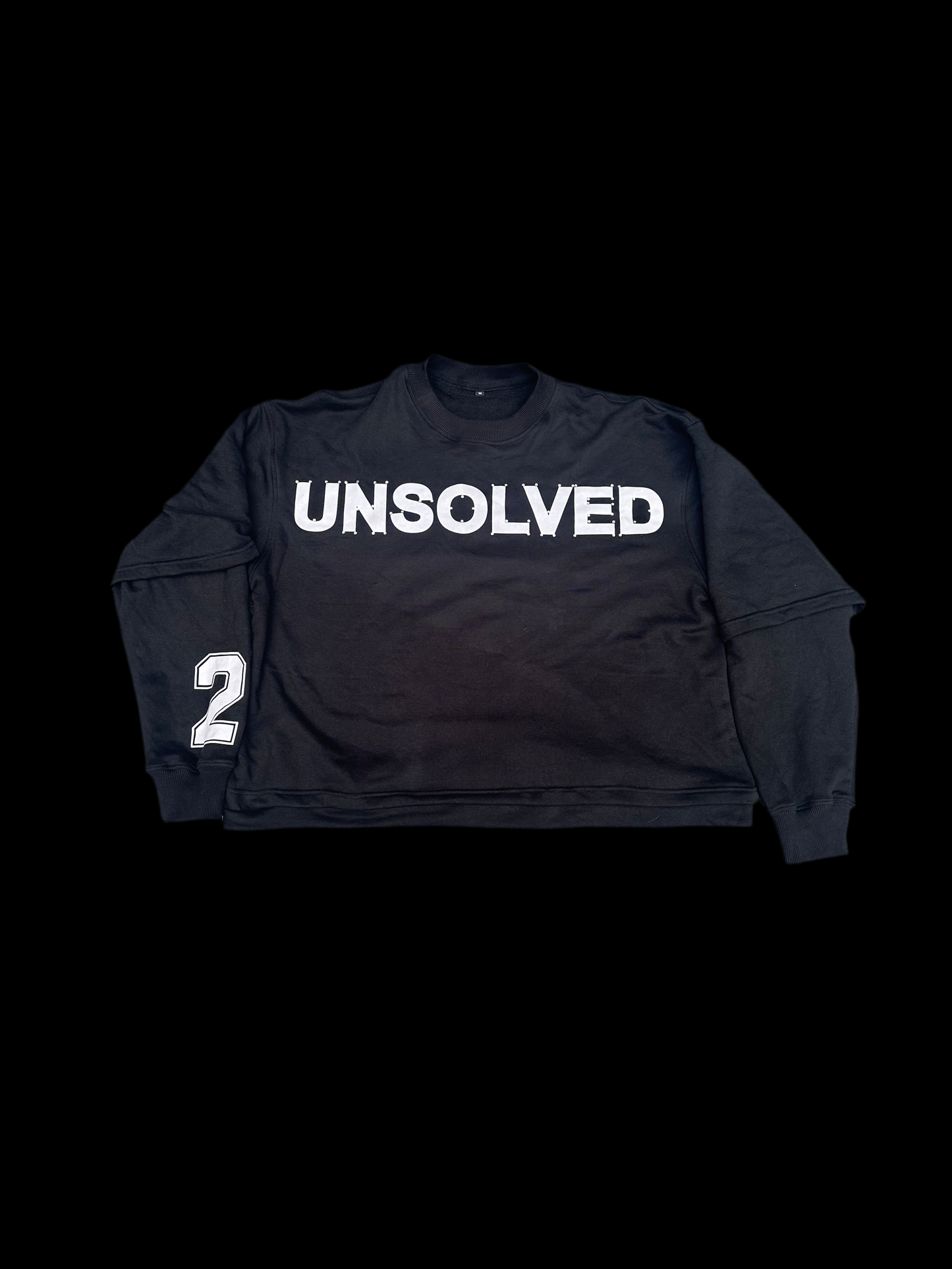 Black UNSOLVED tee